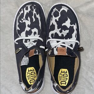 Hey Dude Black and White Sneakers with Playful Graphic Design